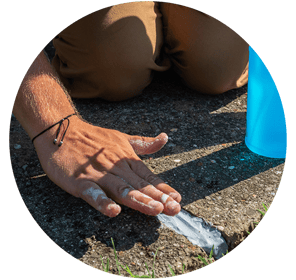 Smoothing concrete caulk between two concrete slabs