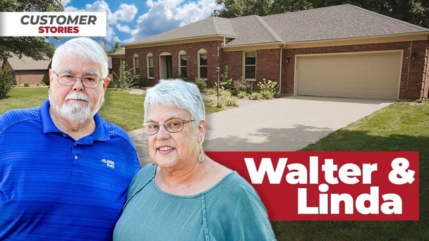 Walter and Linda Coppinger in front of their home