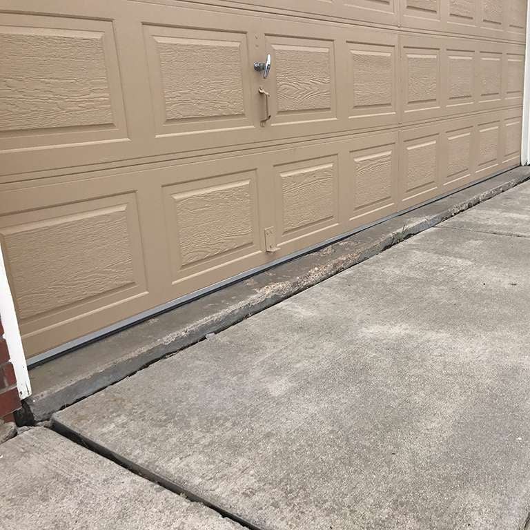 Concrete Driveway Leveling - Before