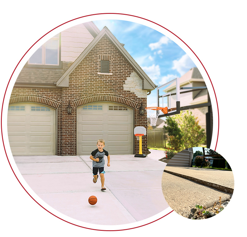 Kid chasing basketball on concrete driveway