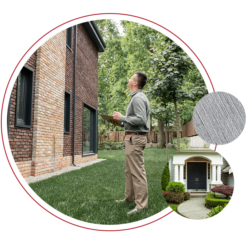 Real estate agent inspecting the side of a brick home