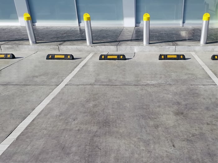 Parking spaces on concrete parking lot