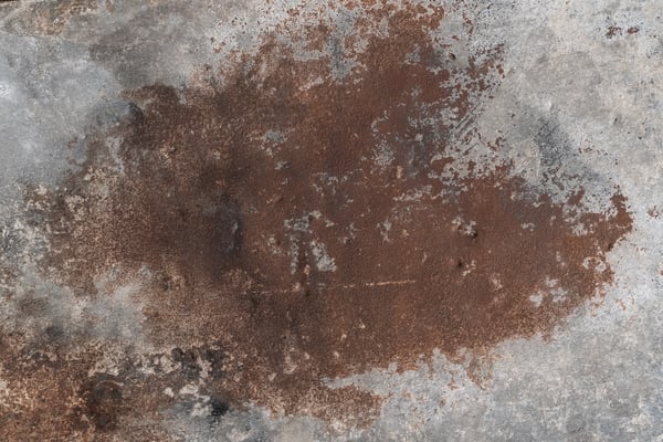 Concrete surface with large rust stain