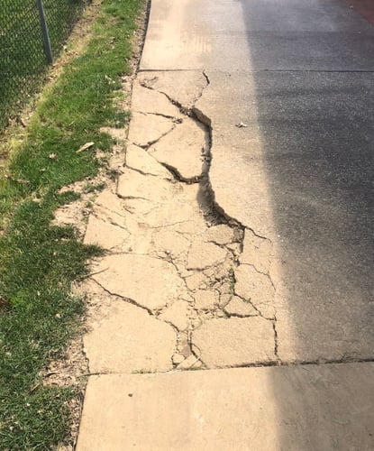 Crushed concrete slab due to heavy equipment overloading