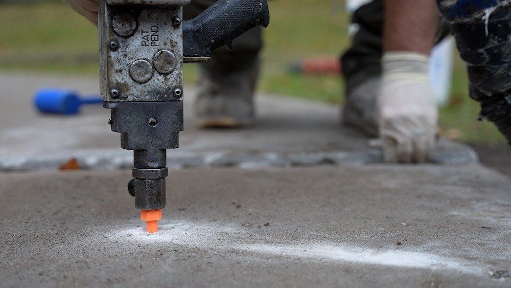 Concrete Leveling Face-Off: Stone Slurry Grout vs. Polyjacking vs ...