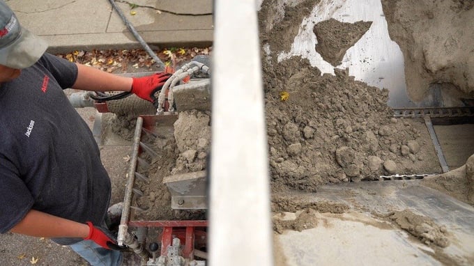 Man mixing stone slurry grout leveling material on the back of the pump truck