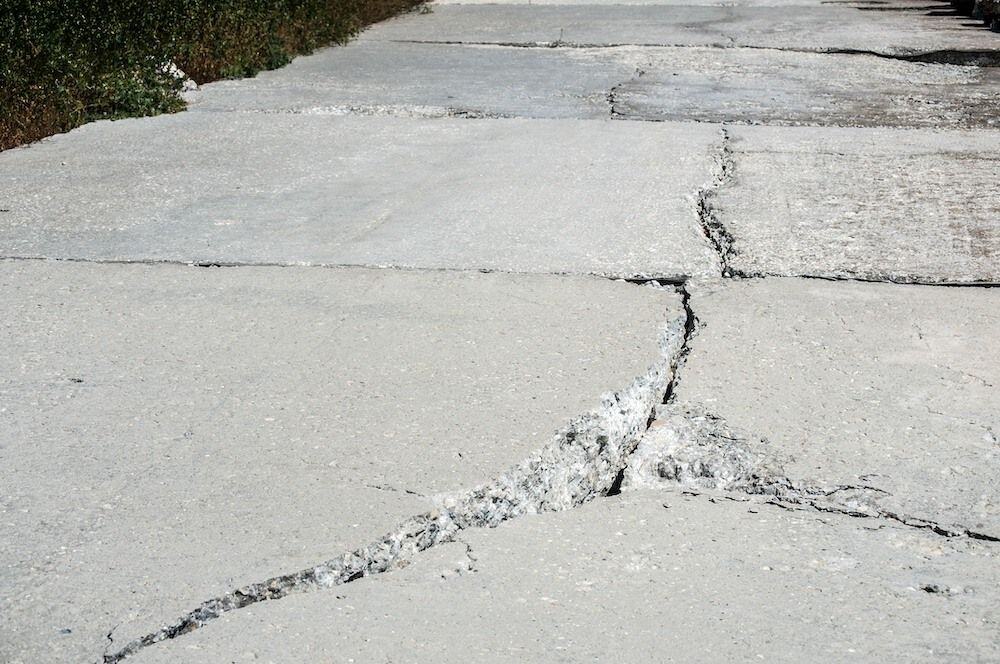 Large cracks in concrete driveway
